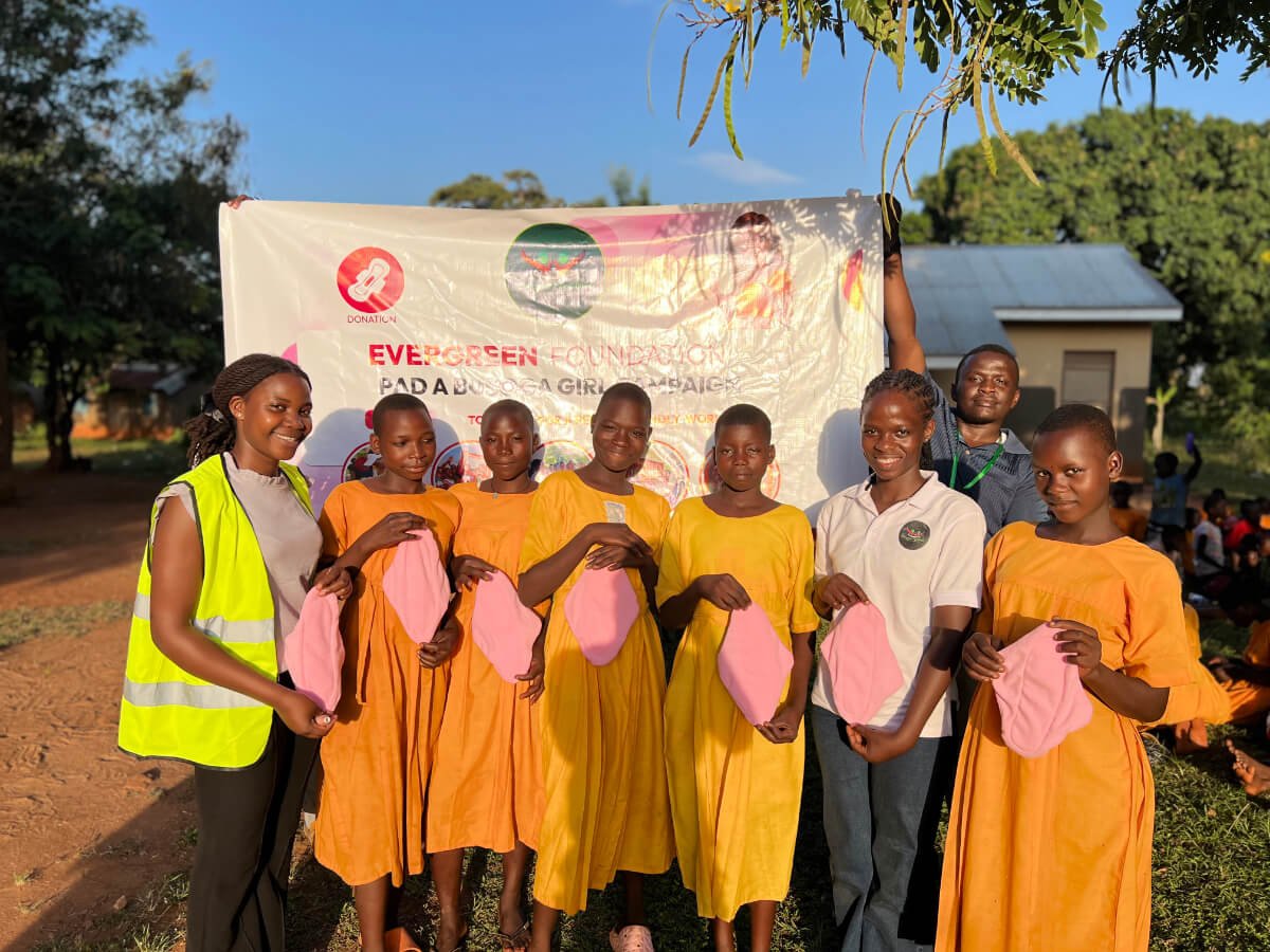 Kyeeya Primary School holding sanitary reusable pads